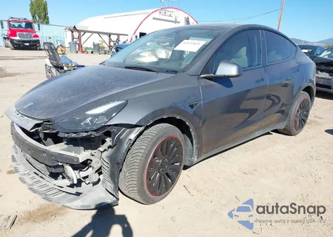 2023 Tesla Model Y Awd/Long Range Dual Motor All-Wheel Drive from USA, damaged, VIN 7SAYGAEE1PF869892